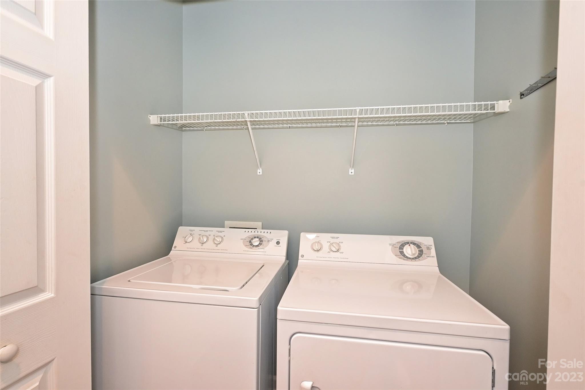 8445 Windsor Ridge Drive Charlotte, NC 28277 - Photo 16 of 26 a utility room with dryer and washer