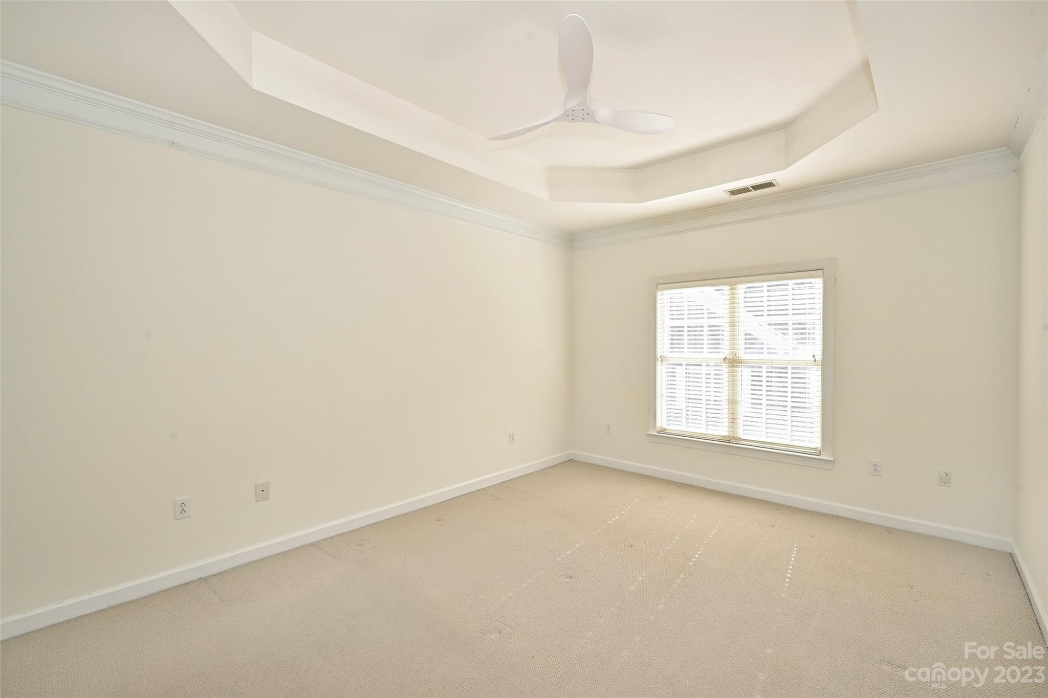 8445 Windsor Ridge Drive Charlotte, NC 28277 - Photo 17 of 26 an empty room with a window