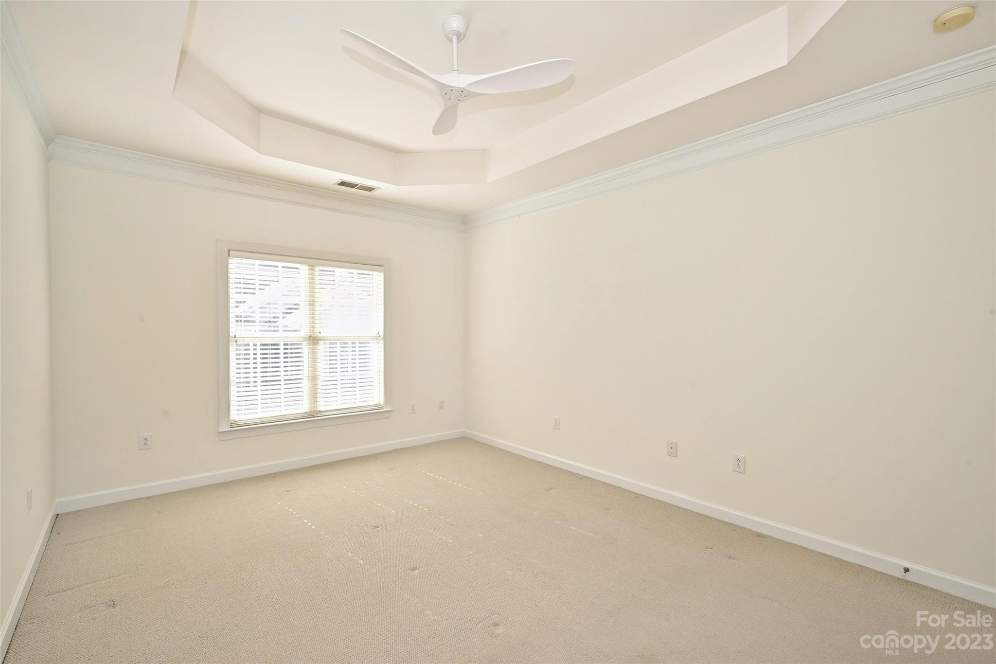 8445 Windsor Ridge Drive Charlotte, NC 28277 - Photo 18 of 26 an empty room with a window