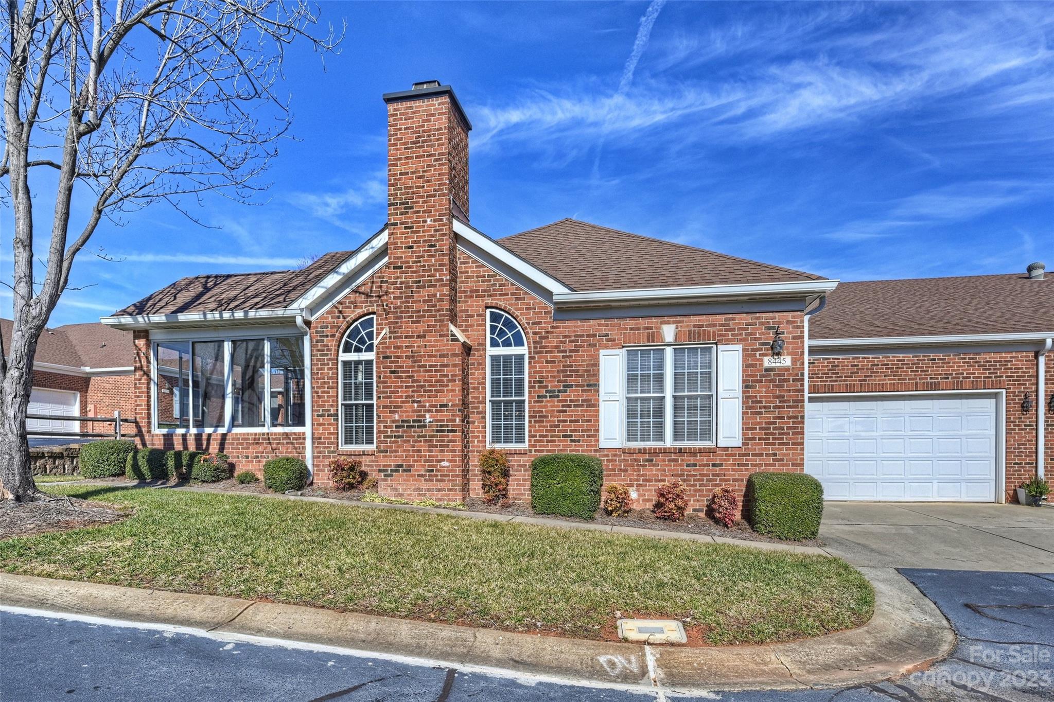 8445 Windsor Ridge Drive Charlotte, NC 28277 - Photo 4 of 26 front view of a house with a yard