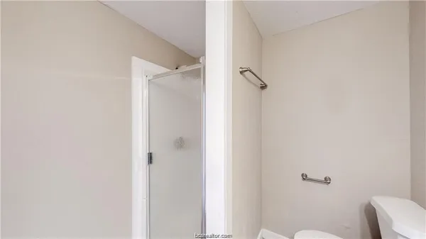 a bathroom with a toilet