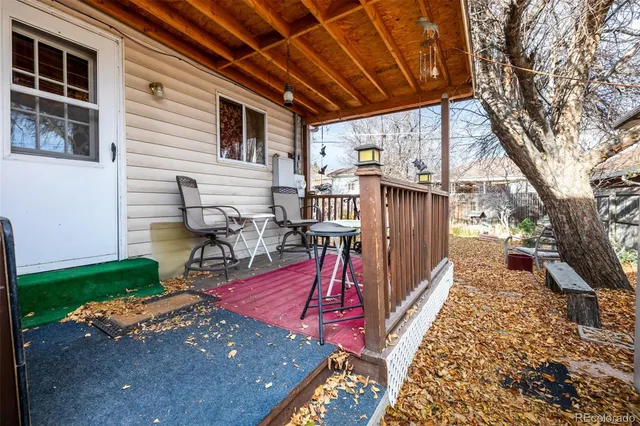 a view of a backyard with a patio