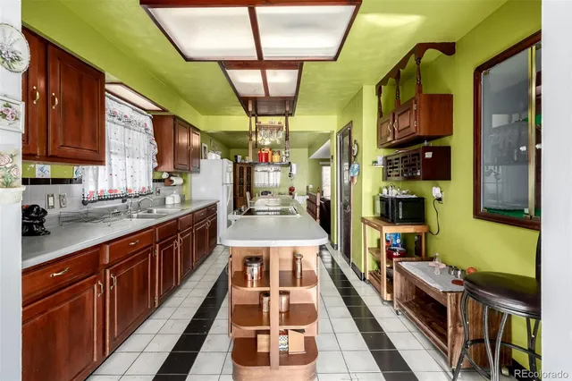 a kitchen with stainless steel appliances granite countertop lots of counter top space