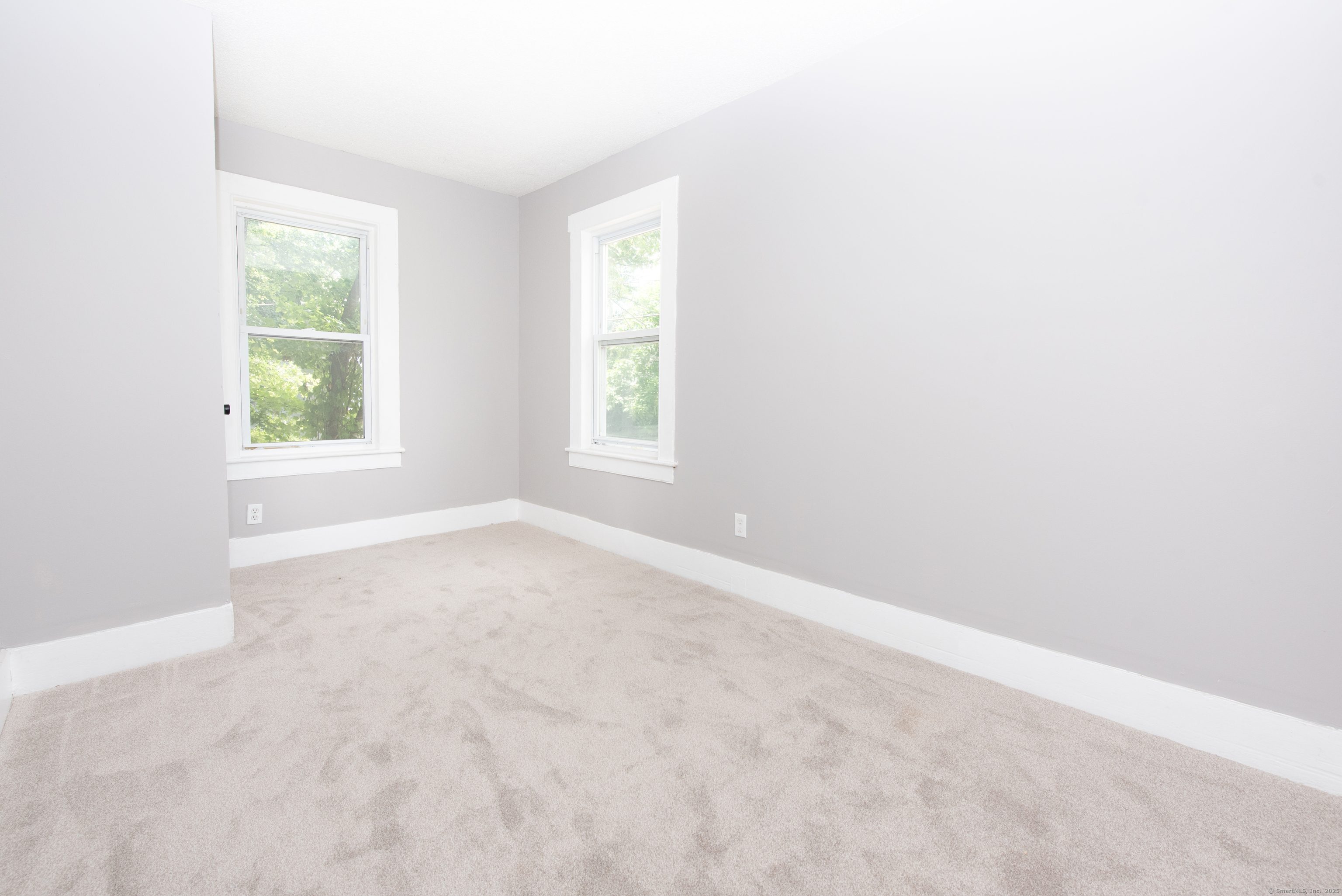 6 Crescent Street Ansonia, CT 06401 - Photo 14 of 25 an empty room with windows