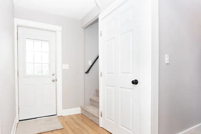 a view of an empty room with a window