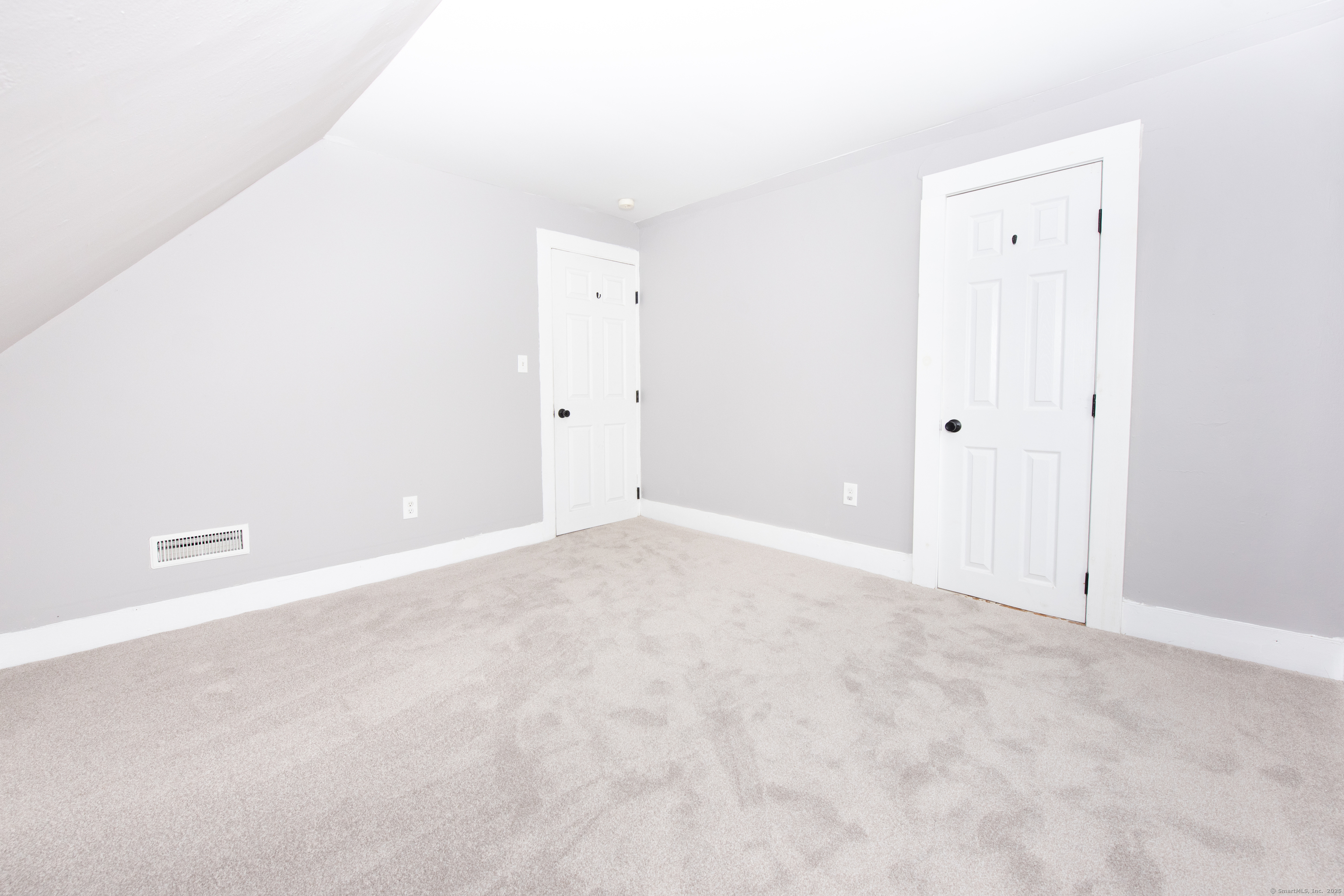 6 Crescent Street Ansonia, CT 06401 - Photo 18 of 25 an empty room with an entryway