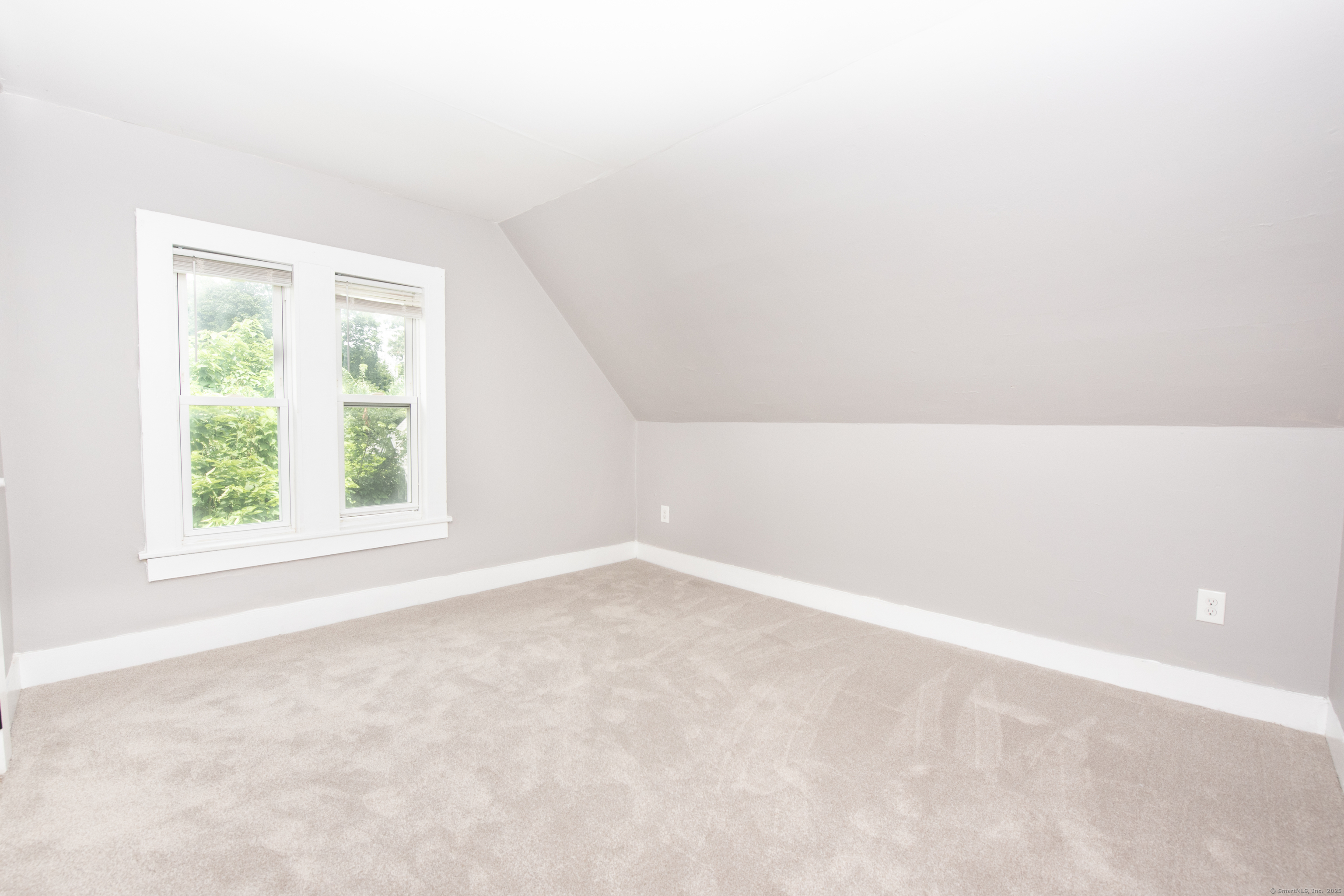 6 Crescent Street Ansonia, CT 06401 - Photo 20 of 25 an empty room with a window