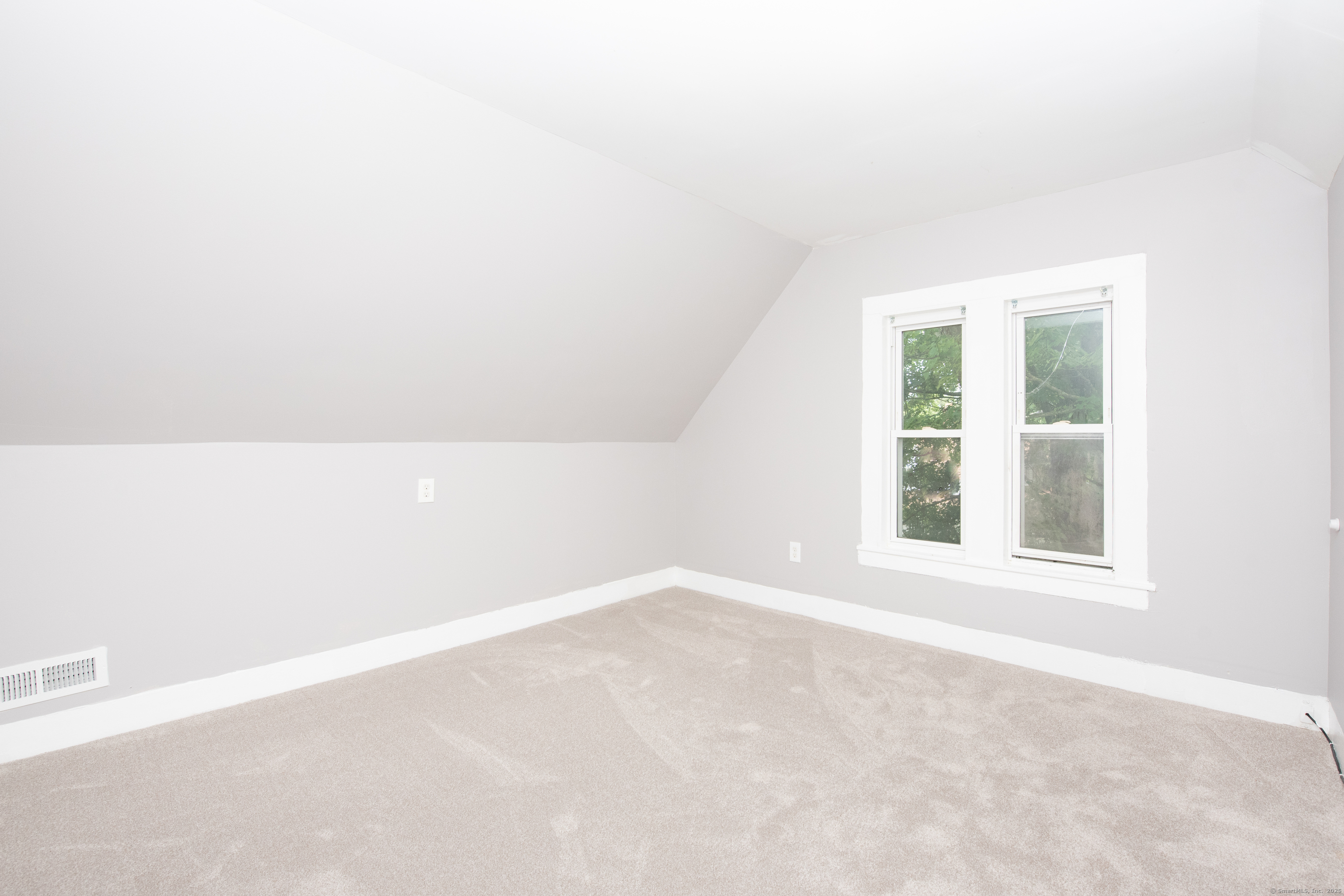 6 Crescent Street Ansonia, CT 06401 - Photo 24 of 25 an empty room with a window