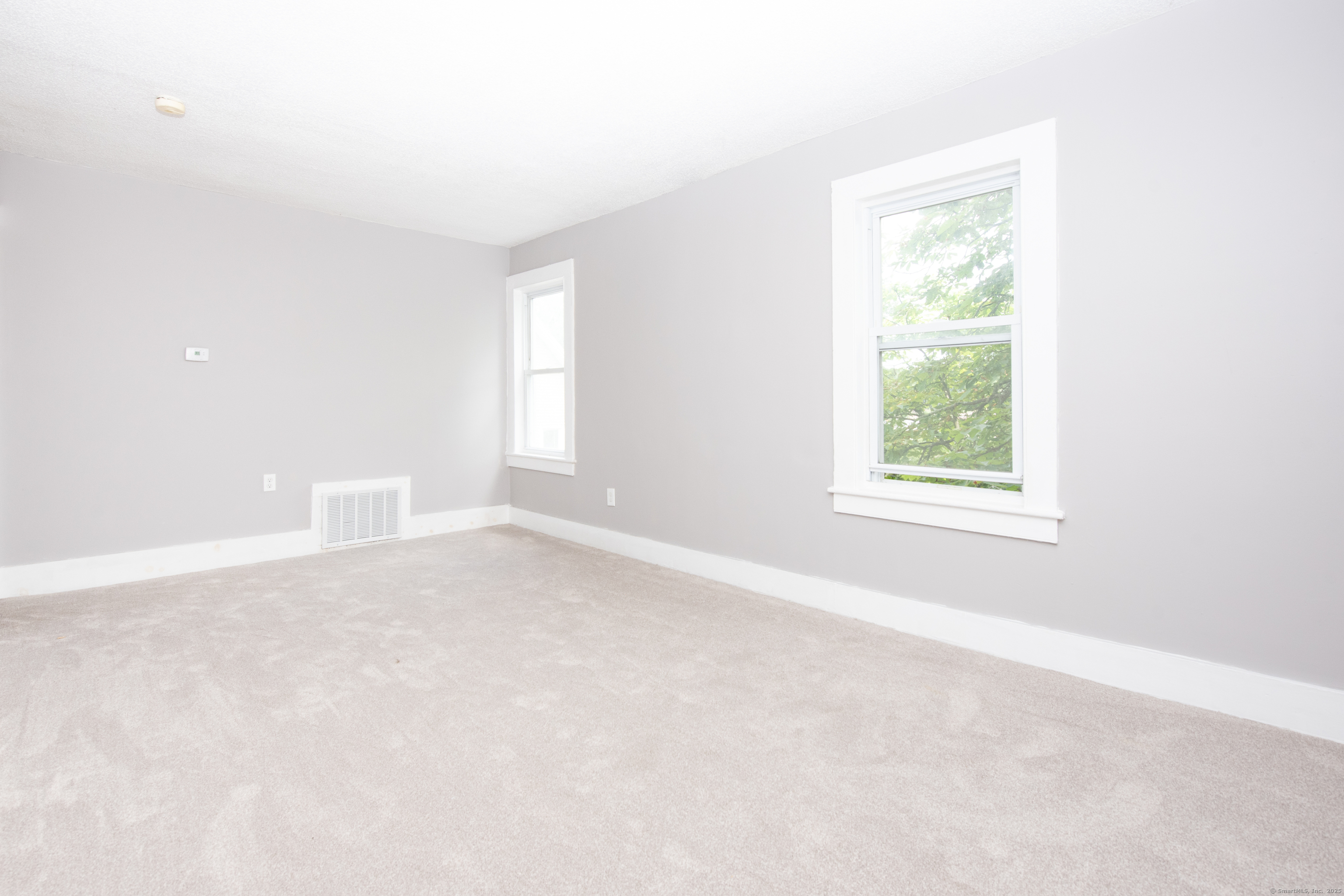 6 Crescent Street Ansonia, CT 06401 - Photo 10 of 25 an empty room with windows