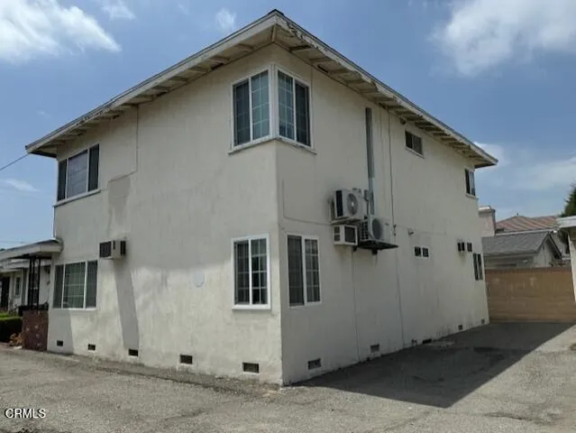 a front view of a house with garage