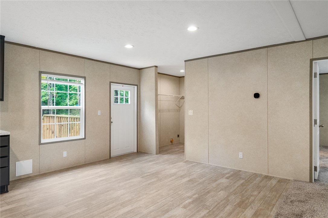 419 Austin Drive Anderson, SC 29624 - Photo 20 of 36 This versatile living space features practical flooring and ample natural light, ideal for everyday living.