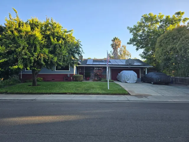 a house view with a garden space