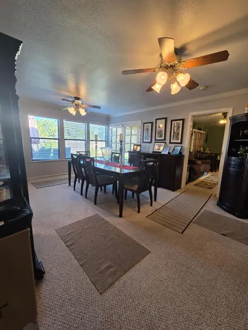 a view of a dining room with furniture