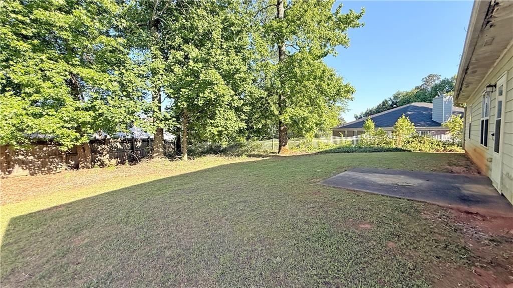 65 Lakeridge Court Covington, GA 30016 - Photo 3 of 17 a view of an outdoor space