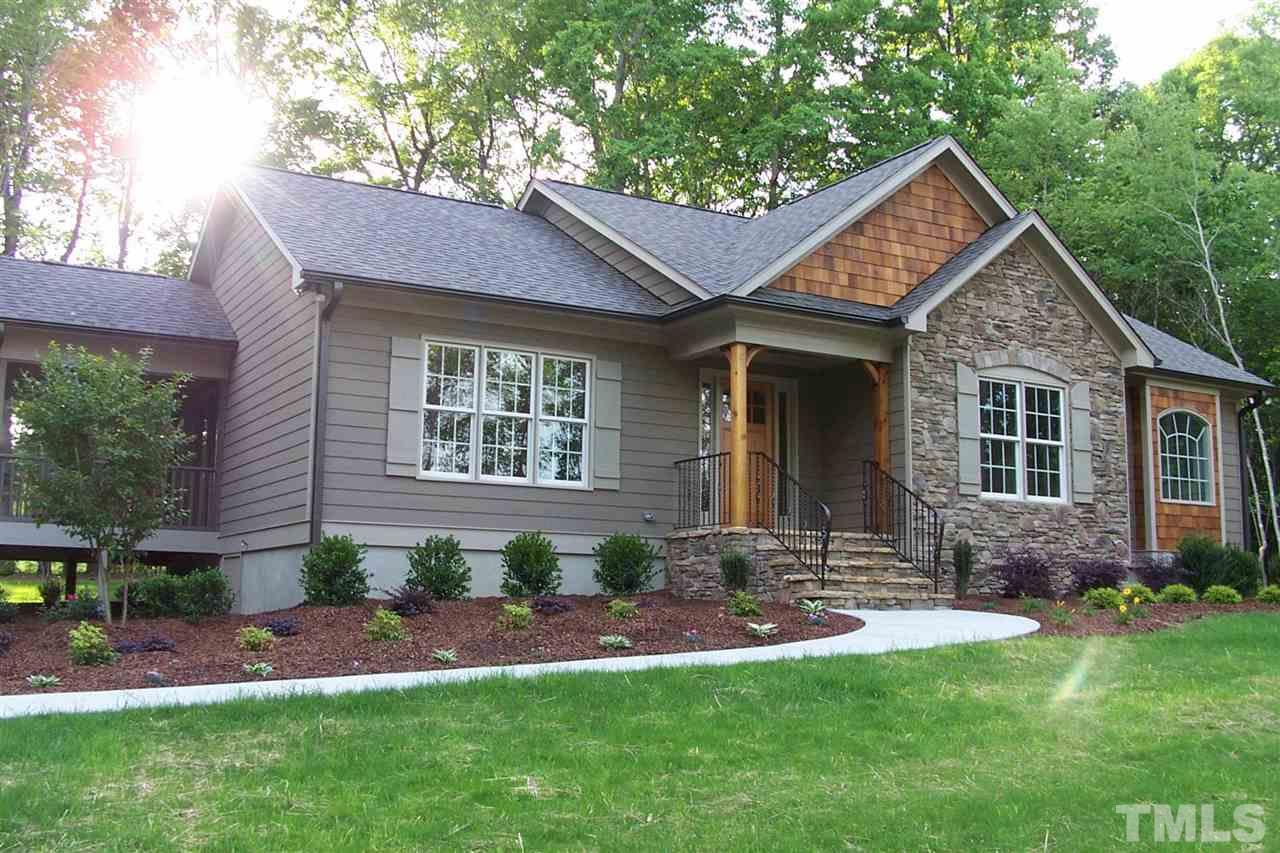 2196 Bowen Road Rougemont, NC 27572 - Photo 1 of 3 a front view of a house with a yard