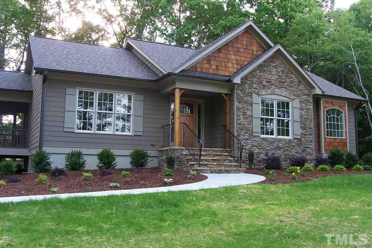 2196 Bowen Road Rougemont, NC 27572 - Photo 2 of 3 a front view of a house with a yard