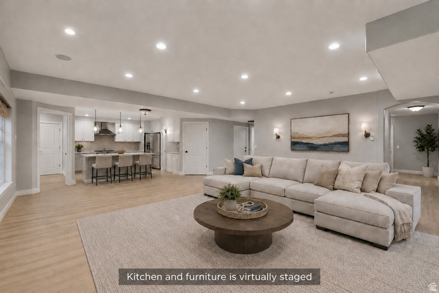 550 Blackhawk Lane Alpine, UT 84004 - Photo 38 of 73 Open-concept living space featuring wood-finish flooring and recessed lighting