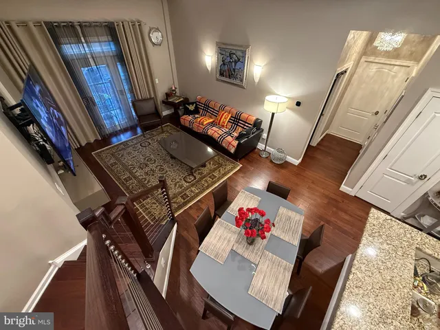 a view of living room and dining room