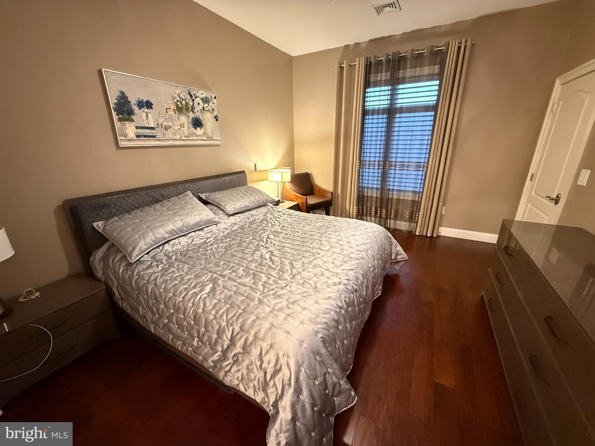 503 Carson Terrace Huntingdon Valley, PA 19006 - Photo 21 of 33 a bed sitting in a bedroom next to a window