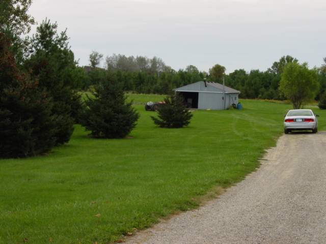 455 West Wellman Line Road Melvin, MI 48454 - Photo 14 of 20 This is another view of the pole barn.