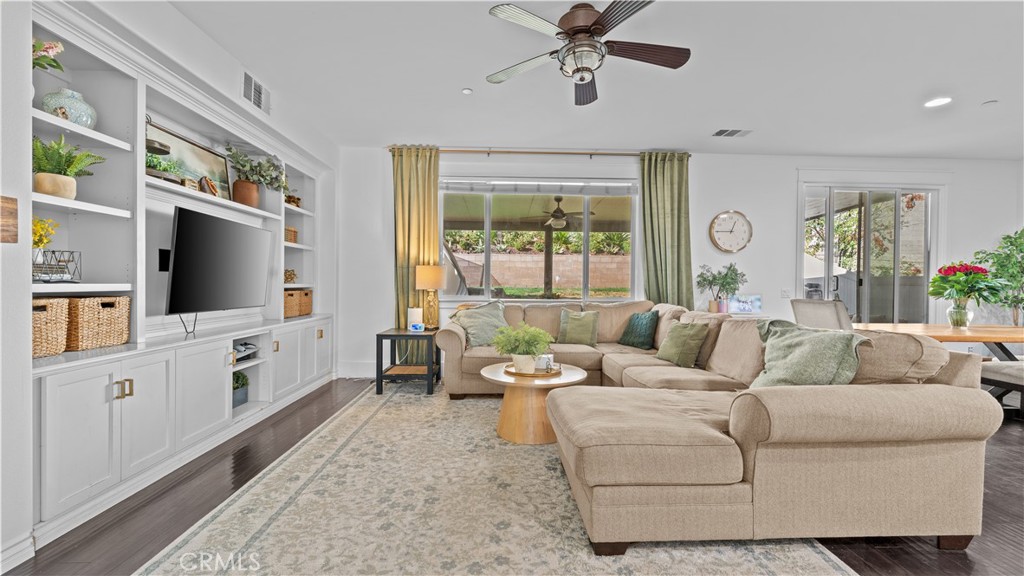 3641 Bur Oak Road San Bernardino, CA 92407 - Photo 4 of 20 a living room with furniture and a flat screen tv