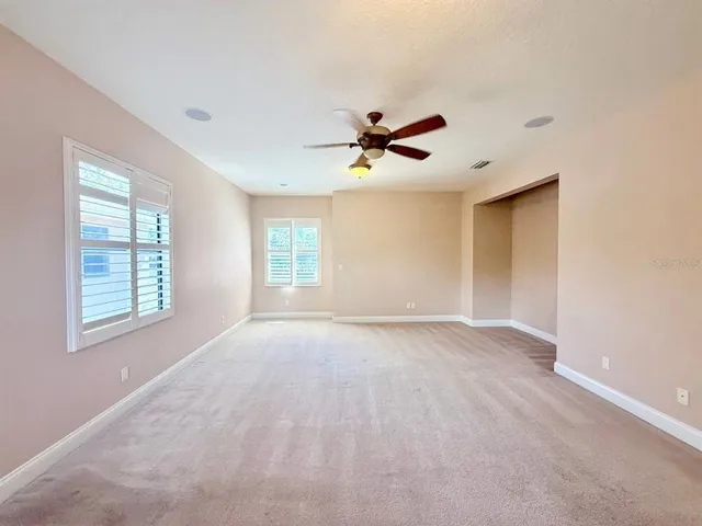 a kitchen with stainless steel appliances granite countertop wooden cabinets a stove top oven a sink and dishwasher