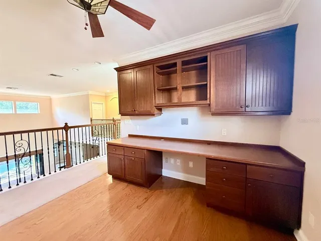 a bathroom with a sink a mirror and a shower