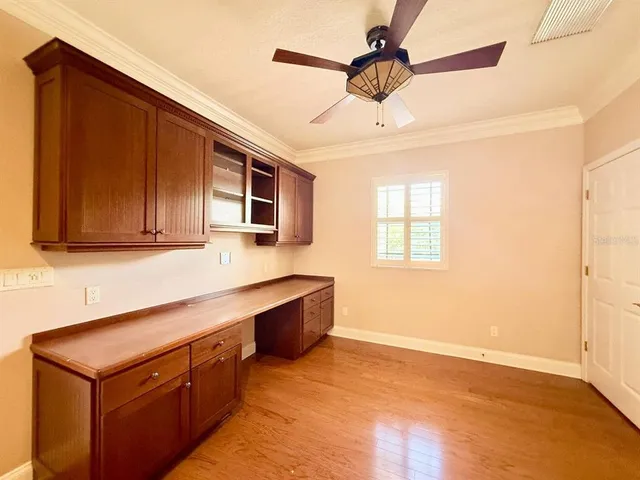 a bathroom with a toilet and bathtub