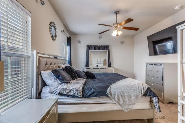 a bedroom with a bed and furniture