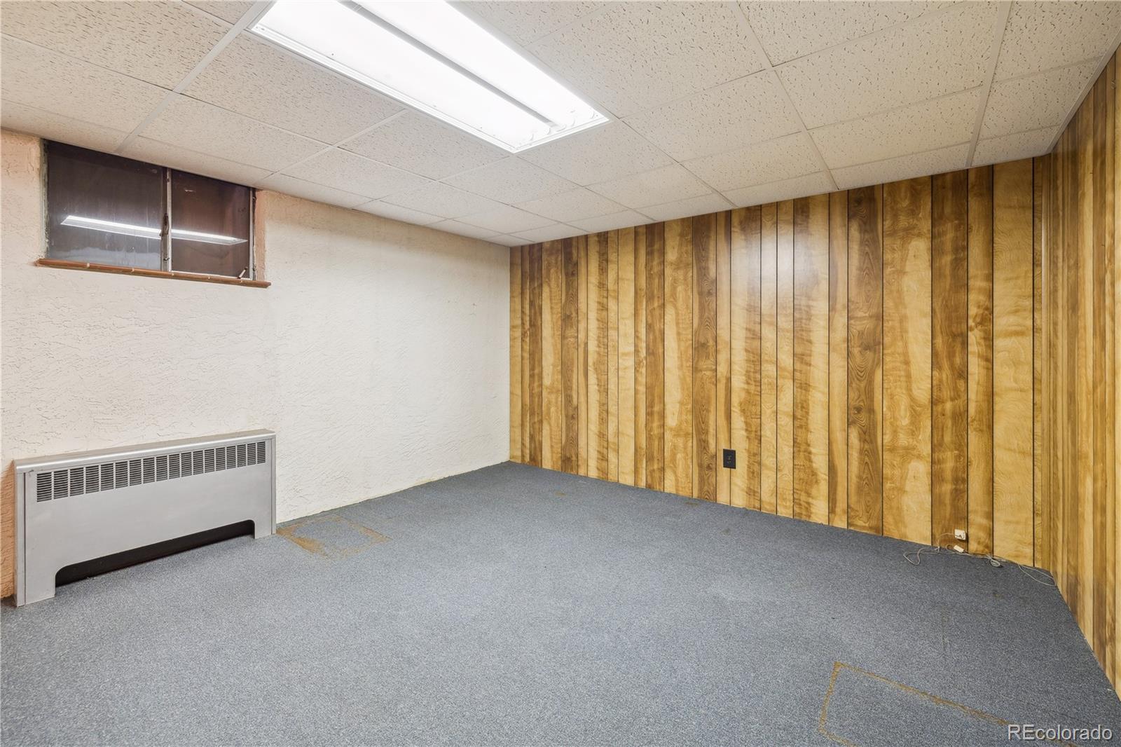 4185 Pierce Street Wheat Ridge, CO 80033 - Photo 19 of 27 a view of an empty room with a window