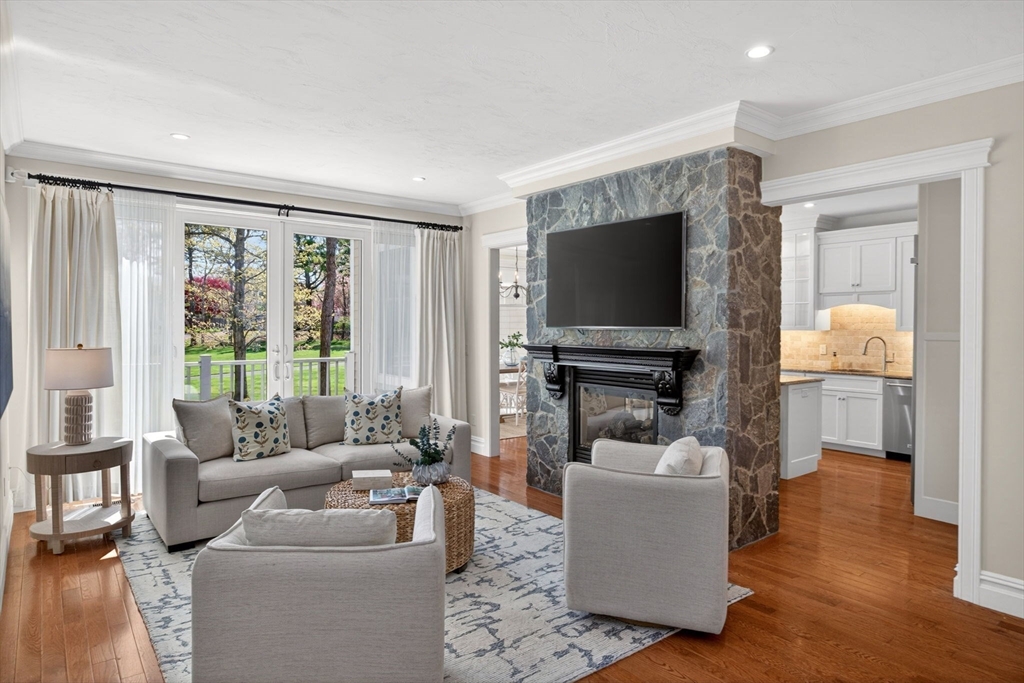 2 Quinns Way, Unit 2 Mashpee, MA 02649 - Photo 13 of 42 a living room with furniture and a flat screen tv