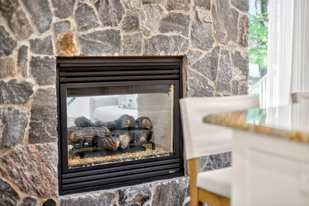 2 Quinns Way, Unit 2 Mashpee, MA 02649 - Photo 20 of 42 a closeup of a fireplace