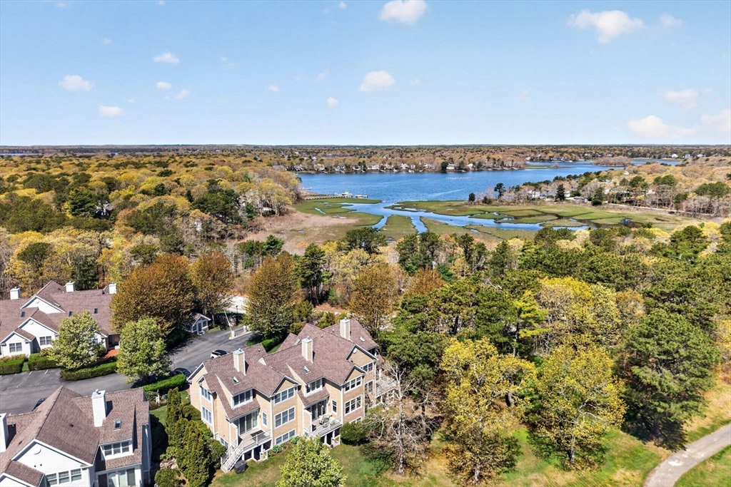 2 Quinns Way, Unit 2 Mashpee, MA 02649 - Photo 2 of 42 an aerial view of a house with a lake view