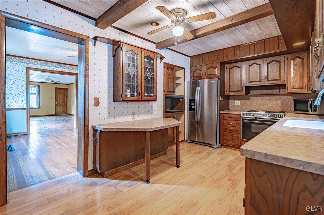 353 Hanover Street Bethlehem, PA 18018 - Photo 11 of 38 a view of kitchen with cabinets and wooden floor