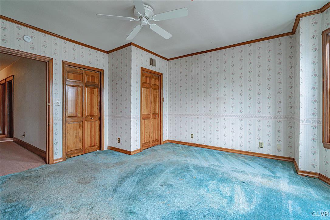 353 Hanover Street Bethlehem, PA 18018 - Photo 15 of 38 an empty room with closet and a ceiling fan