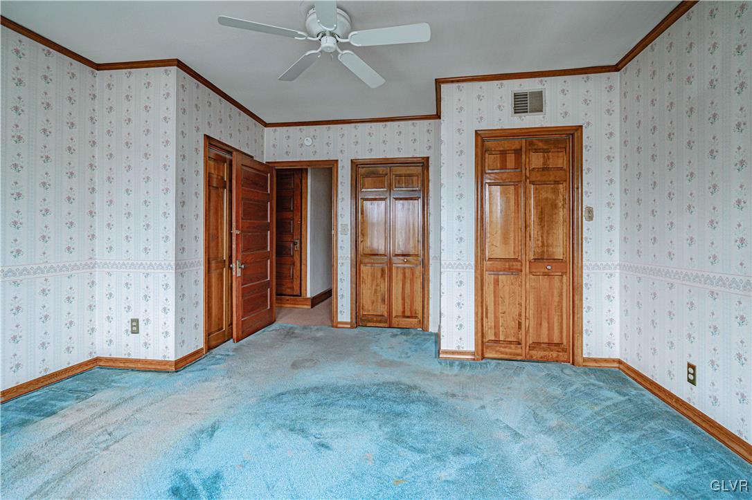 353 Hanover Street Bethlehem, PA 18018 - Photo 16 of 38 an empty room with closet and a chandelier fan