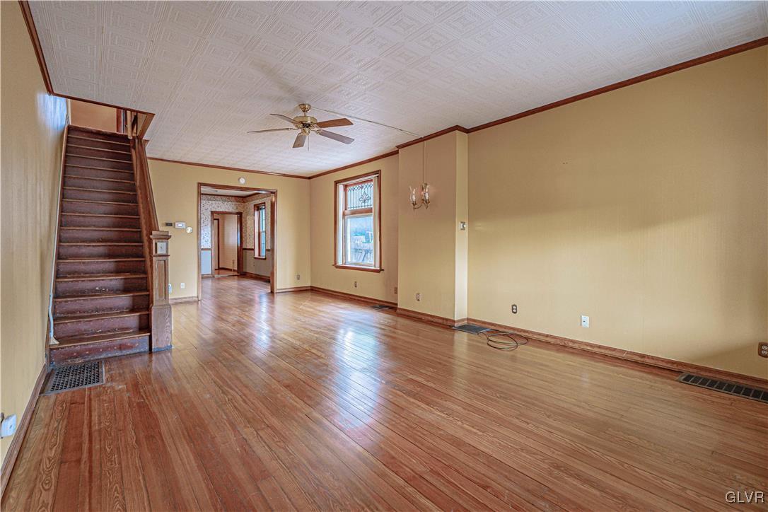 353 Hanover Street Bethlehem, PA 18018 - Photo 5 of 38 wooden floor in an empty room with a window