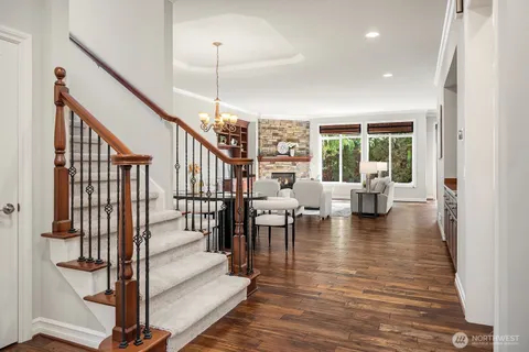 a view of a living room and entryway