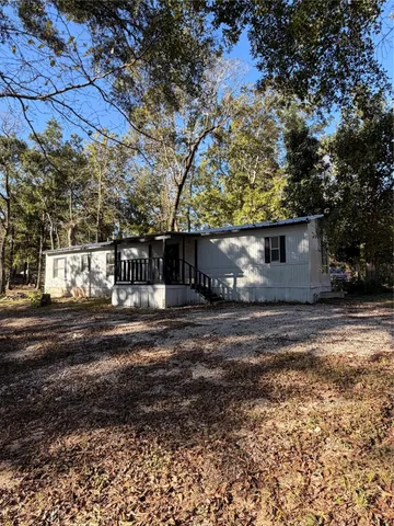a view of a yard with an outdoor space