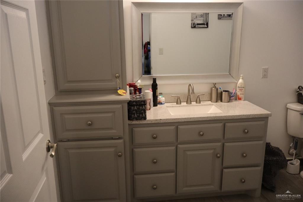 1034 Sunrise Rio Grande City, TX 78582 - Photo 15 of 37 a bathroom with a sink and a mirror