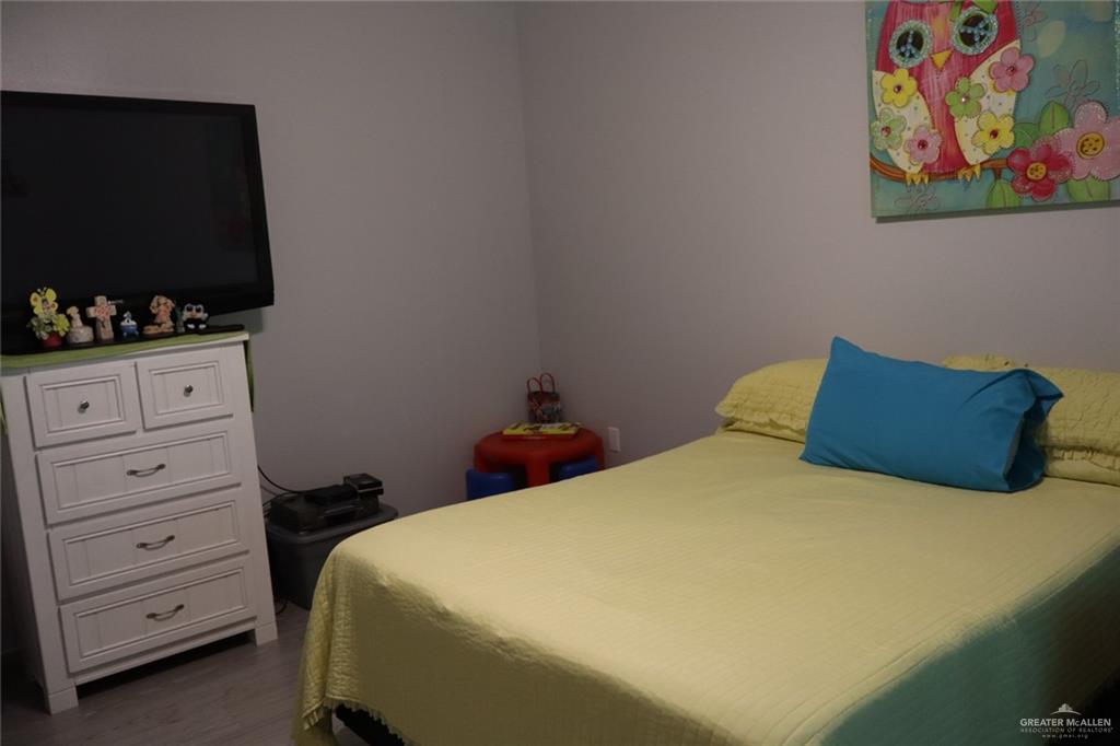 1034 Sunrise Rio Grande City, TX 78582 - Photo 27 of 37 a bed room with a bed and a television