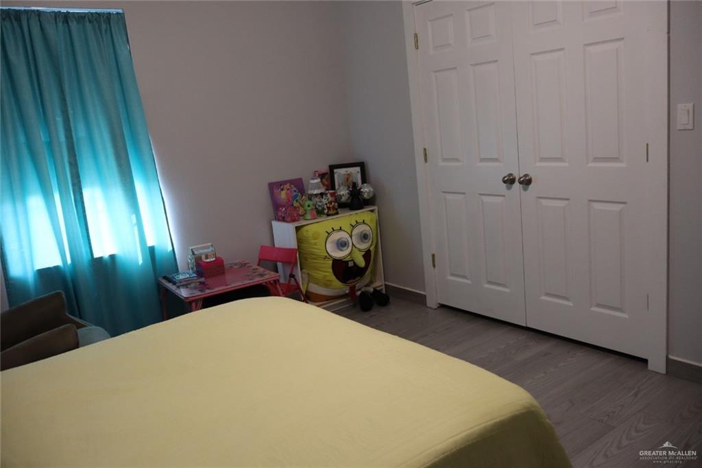 1034 Sunrise Rio Grande City, TX 78582 - Photo 28 of 37 a bedroom with a bed and a window