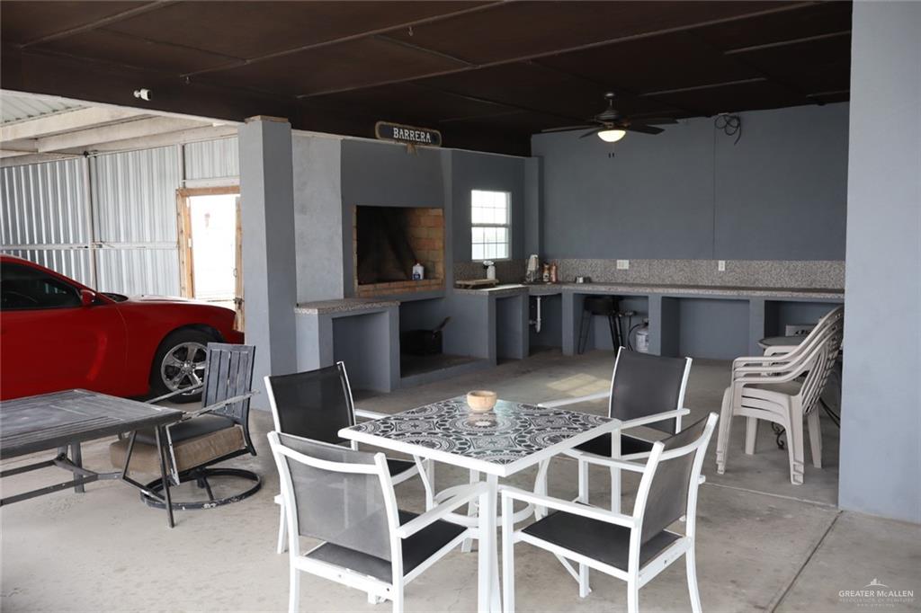 1034 Sunrise Rio Grande City, TX 78582 - Photo 32 of 37 a view of a dining room with furniture
