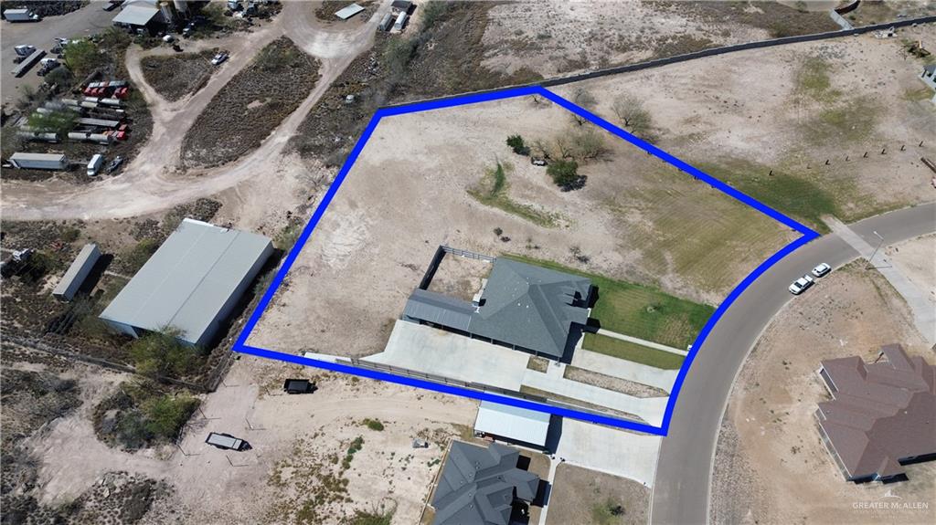 1034 Sunrise Rio Grande City, TX 78582 - Photo 35 of 37 an aerial view of a house with wooden stairs