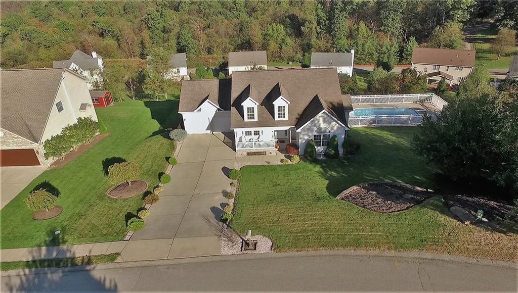 4000 Oak Point Circle McKees Rocks, PA 15136 - Photo 2 of 25 S&A Built Home on over 1/2 Acre - An amazing backyard with separately fenced HEATED in ground pool but also offering a large flat backyard with room enough to run and play.