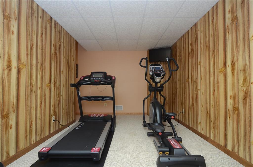 4000 Oak Point Circle McKees Rocks, PA 15136 - Photo 11 of 25 Gym is located on Lower Level. The Gameroom is off to the left and the Wine Cellar is to the right along with an extra third garage bay for Storage.