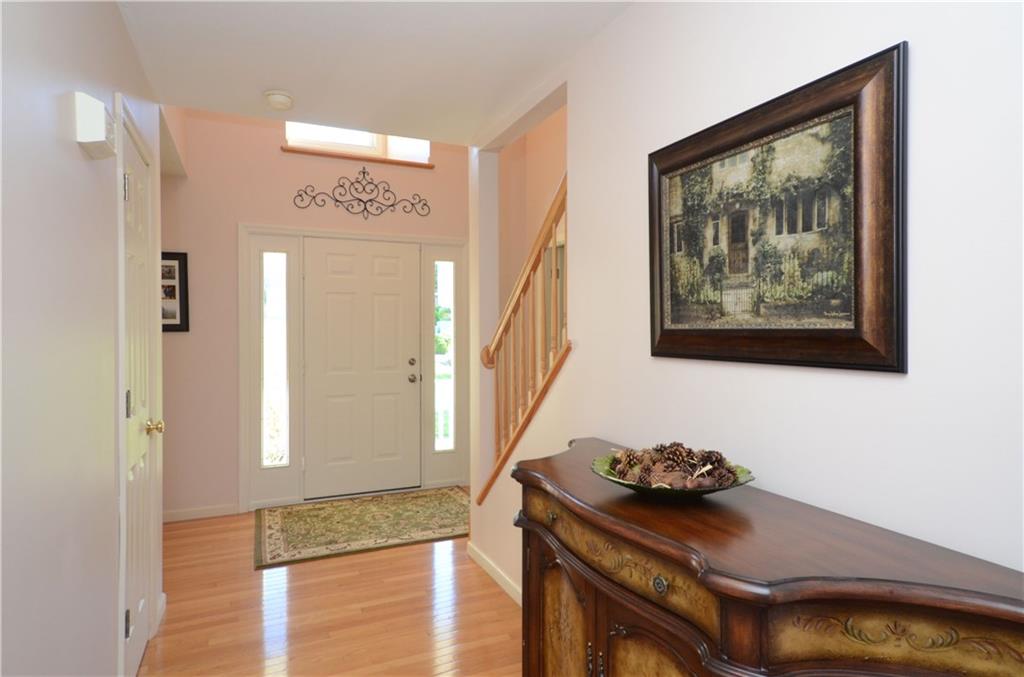 4000 Oak Point Circle McKees Rocks, PA 15136 - Photo 4 of 25 Two-Story Foyer allows plenty of natural light in. And wide Entry Hall leads to Family Room and Kitchen.