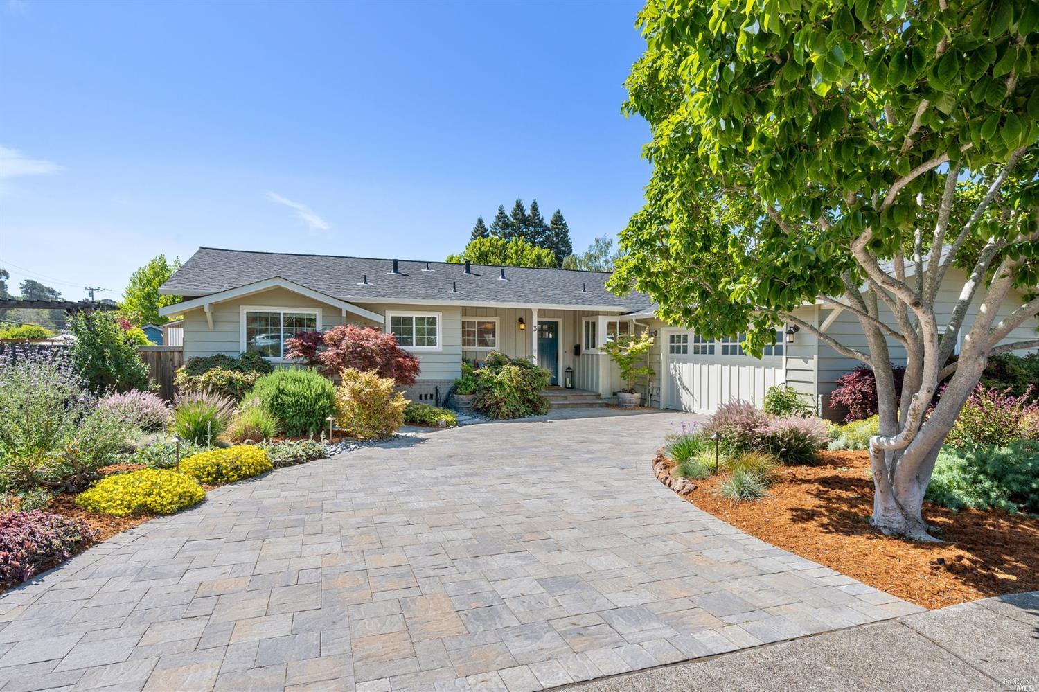 3 Rollingwood Drive San Rafael, CA 94901 - Photo 1 of 1 a front view of a house with a yard and potted plants