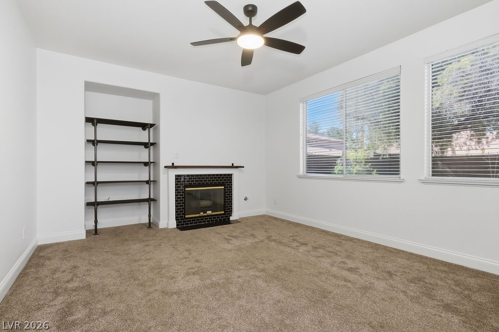 2376 Tilden Way Henderson, NV 89074 - Photo 18 of 54 Large window to the back yard from living room. Includes fireplace.