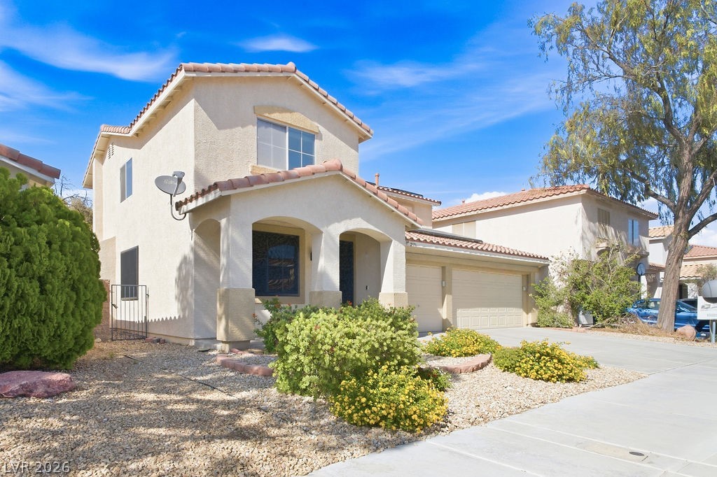 2376 Tilden Way Henderson, NV 89074 - Photo 2 of 54 Front of home including low maintenance landscape and 3 car garage.